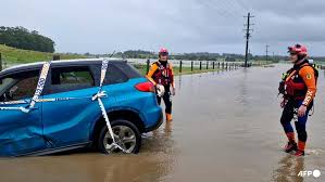 Flood victims stranded on roofs as downpours lash eastern Australia - CNA