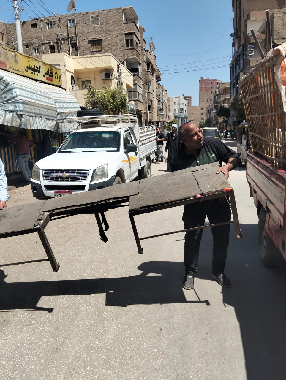 إزالة الإشغالات في أبو تيج بأسيوط