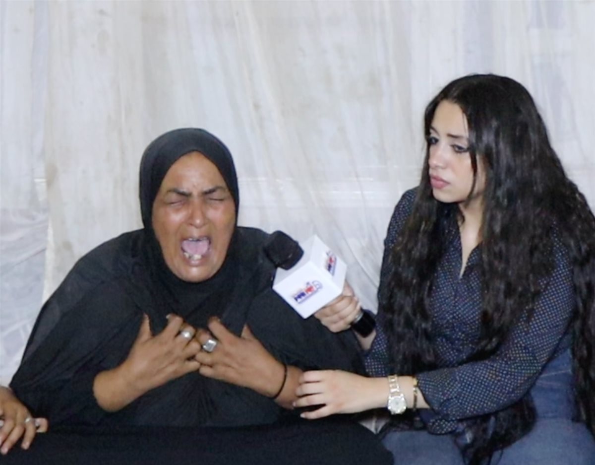 والده امل ضحية زوجها مع مراسلة نيوز رووم 