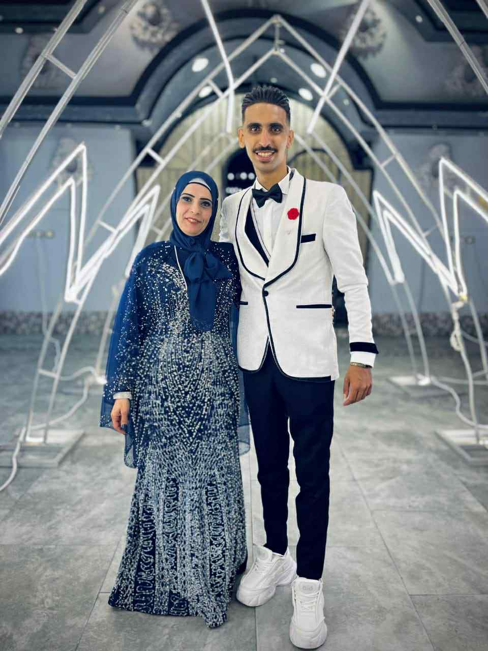 المجني عليها مع ابنها يوسف