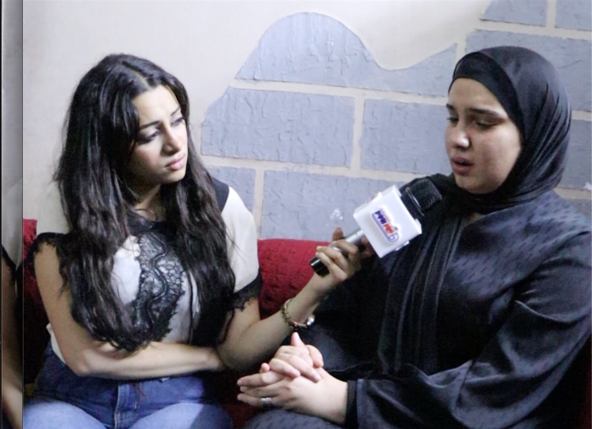 زوجة الضحية و مذيعة نيوز رووم 