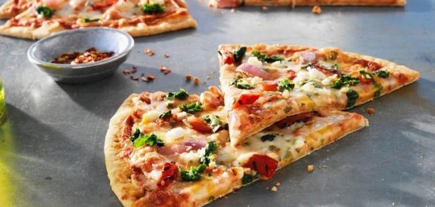 طريقة عمل عجينة البيتزا الإيطالية