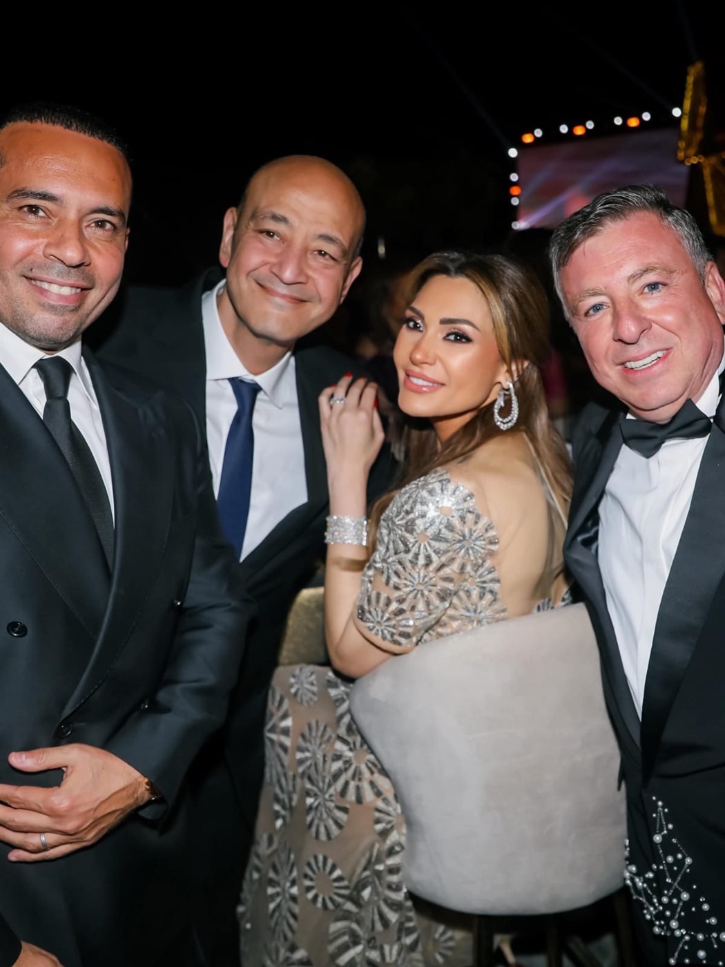عمرو أديب ودينا طلعت من حفل زفاف ابنة باسل سماقية