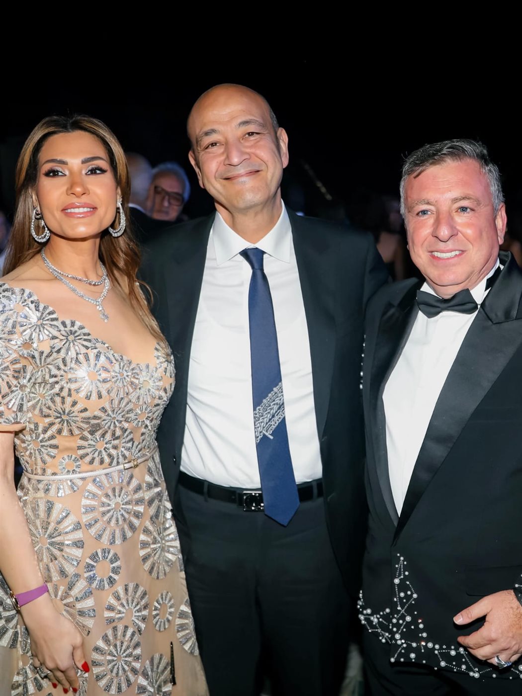 عمرو أديب ودينا طلعت من حفل زفاف ابنة باسل سماقية