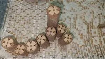 ظهور علامة الصليب داخل شجرة بكنيسة سمالوط يثير الجدل في المنيا