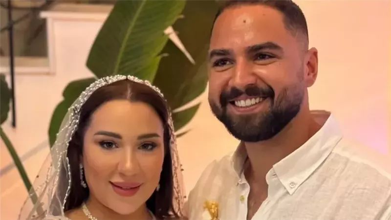 أسما شريف وزوجها