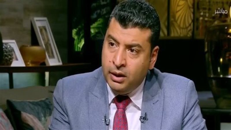 الكاتب الصحفي محمود