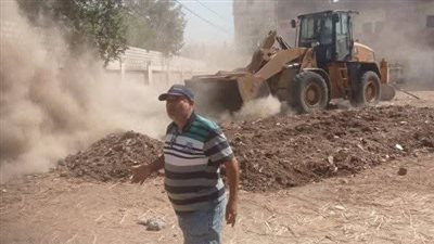 رفع المخلفات وتطهير محيط اللجان استعدادا لاستقبال انتخابات الشيوخ بقنا|صور