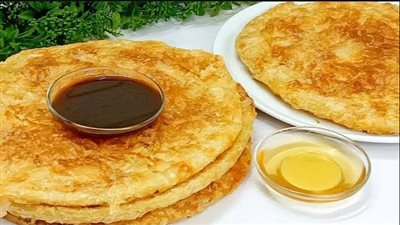 فطار الأبطال.. طريقة عمل الفطير المشلتت وتقديمه مع أطباق حلوة وحادقة