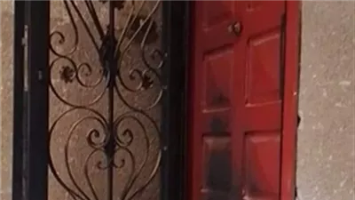 بسبب خلافات الجيرة سيدة وابنتها تشعلان النار في باب شقة جارهما بالجيزة 