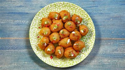 لقيمات محشية بالقشطة: حلوى شهية ولذيذة لكل المناسبات 