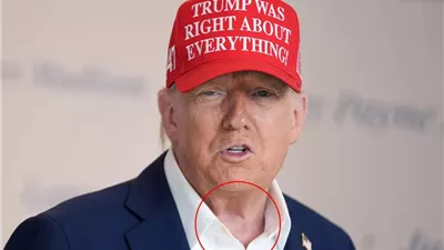 قميص ترامب يضعه في حرج أمام الكاميرات في البيت الأبيض