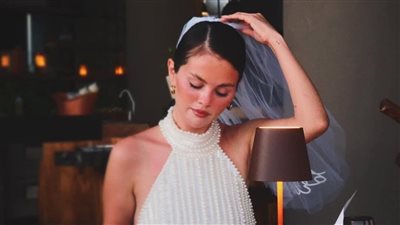 بالطرحة والفستان الأبيض .. سيـلينا غـوميز تودع العزوبية (صور)