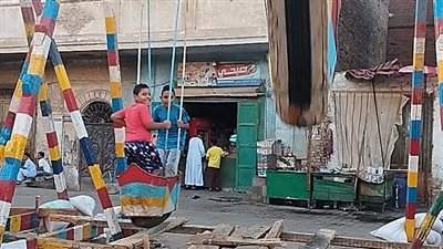 نكهات تقليدية وأجواء شعبية.. كيف يحتفل أهالي دشنا بالمولد النبوي؟ 