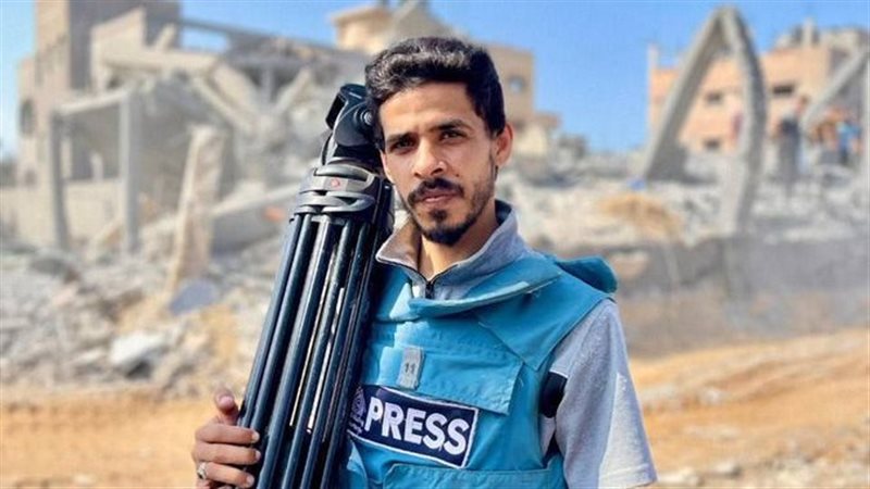 المصور الصحفي رسمي