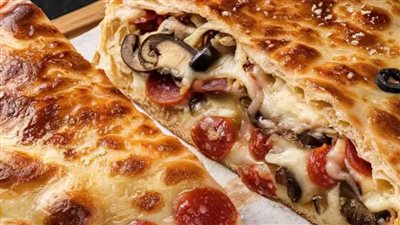 طريقة عمل الكالزوني الإيطالية بالجبنة والخضار.. فطور لذيذ وسريع 	