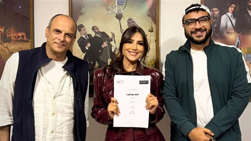 مي عمر مع المؤلف