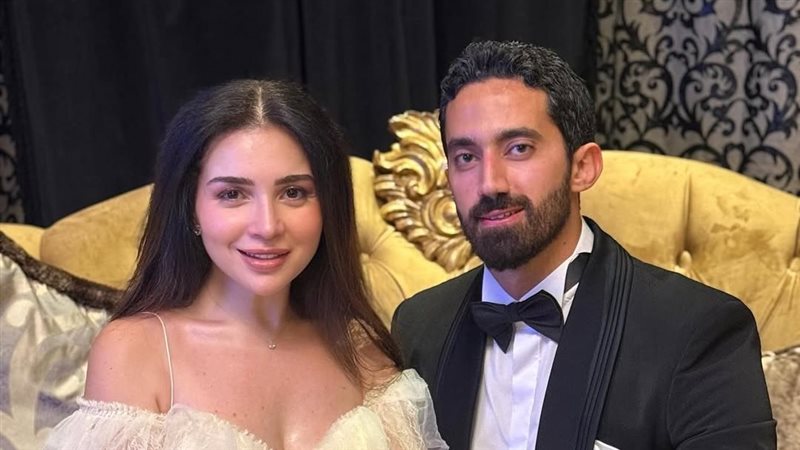 مي عز الدين وزوجها