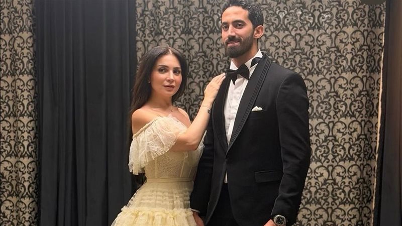 مي عز الدين وزوجها