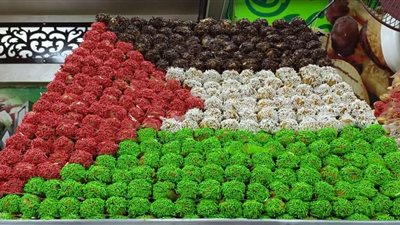 كحك العيد بألوان فلسطين.. مبادرة صاحب مخبز حلويات في سوهاج- صور