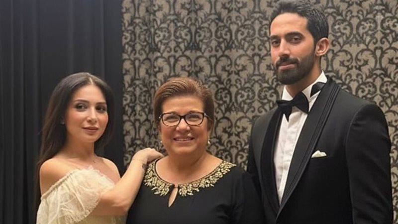 مي عز الدين وزوجها