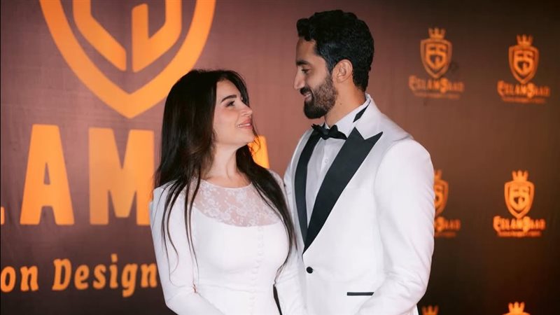 مي عز الدين وزوجها