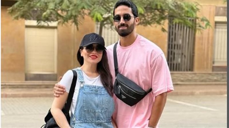 مي عز الدين وزوجها