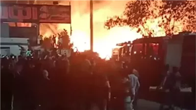 حريق بعشة طيور أعلى سطح عقار في الوراق وإخماده دون إصابات