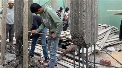 محافظة الجيزة تضبط وتزيل مخالفات بناء بحي العمرانية | صور 