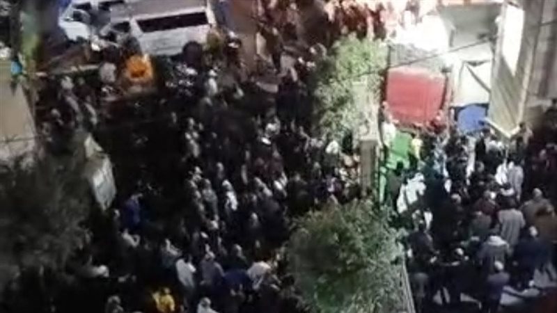 تشييع جثامين أب وابنيه