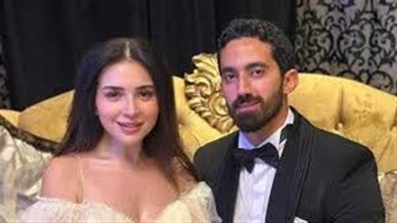 مي عز الدين وزوجها