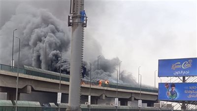 السيطرة على حريق سيارة أعلى كوبرى أكتوبر دون إصابات