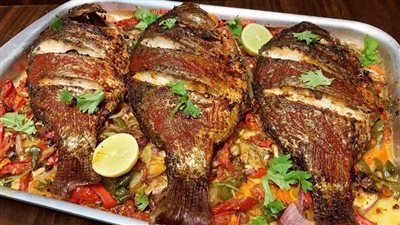 لسفرة النهاردة.. طريقة عمل صينية السمك البلطي في الفرن .. شهية ومفيدة 