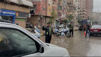 بسيارات الإغاثة والأوناش.. انتشار مكثف للمرور والحماية المدنية لمواجهة الأمطار