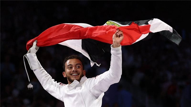 البطل الأولمبي محمد