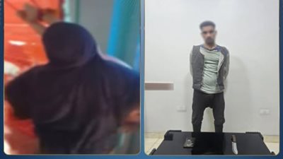 ربطه من رجله في الباب.. ضبط [ب تعدى على ابنه وهدده بالسلاح انتقاما من زوجته
