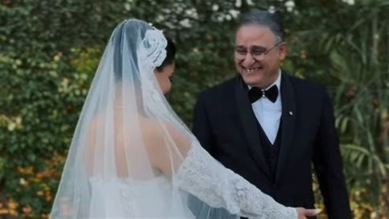 أشرف طلبة وابنته