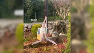 جيش الاحتلال يحقق في صورة جندي إسرائيلي يضرب تمثال السيد المسيح بلبنان