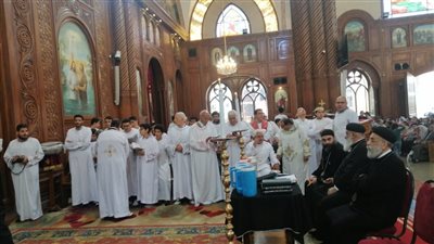 السعف والتراتيل تزين كنائس الفيوم فى أحد 