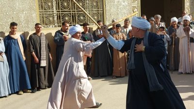 الليلة الكبيرة لمولد بني حميل بسوهاج.. والتحطيب يجمع الأجيال للرقص بالعصا |صور