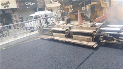 بعد 3 سنوات من الإغلاق.. أعمال الرصف النهائية بكوبري الباجور العلوي
