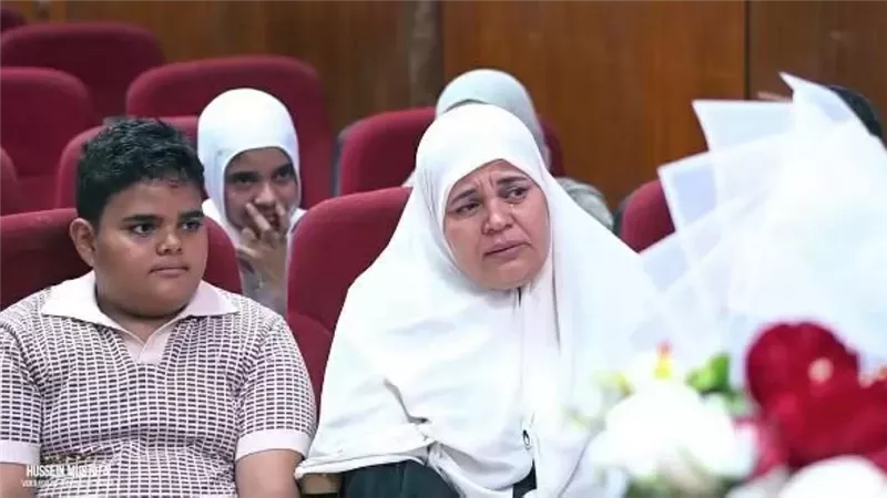 والدة الطالبة