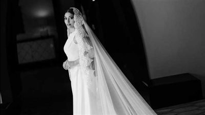 ثلاثة مصممي أزياء خلف إطلالة مي الغيطي في حفل زفافها 