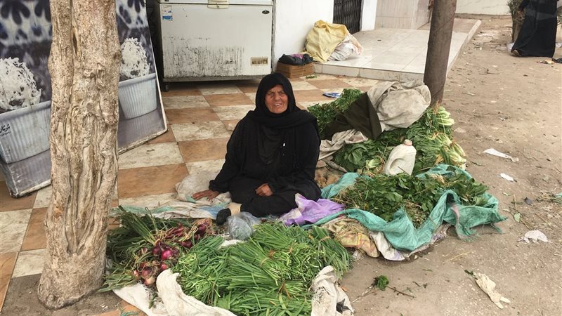 أم على بائعة الخضار